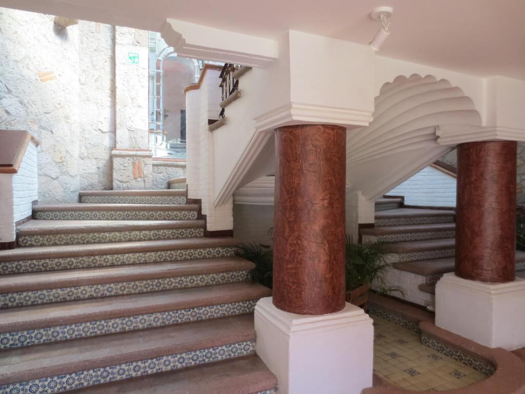 Tiled colonial staircase inside the hotel