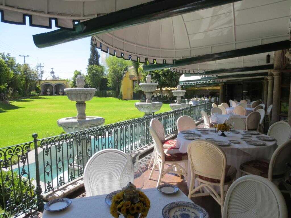 Restaurant terrace overlooking the garden fountains
